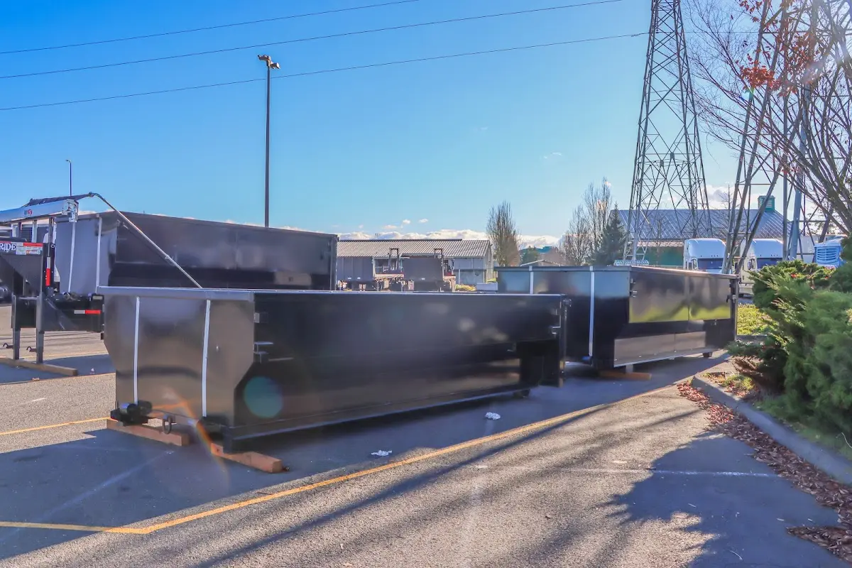 Roll-off dumpster ready for waste disposal at job site for 2 Yard Dumpster Rental in Silverthorne
